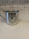 Empire Silver Pewter Baby Cup With Raised Repousse Scroll & Handle Left. Fixed Price $18.00.