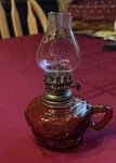 Amber Glass Oil Lamp With Bell Shade, Metal Fittings, Knob Control, Lantern. Fixed Price $80.00.