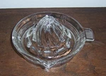 Clear Glass Twisted Juice Reamer - Tab Handle Hazel Atlas Cross Hatch (#12). Fixed Price $8.99.