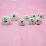 8 Pull Knob White Ceramic With Blue Flowers. Fixed Price $14.61.