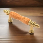 Amerock Royal Family Polished Brass 3"CC Bar Pull Oak Wood Center BP76242-O3. Fixed Price $12.88.