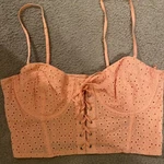 Floral Eyelet Crop Top With Built-in Bra And Lace Up Bow Center- Orange, Small. Fixed Price $19.99.