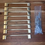 Lot Of 8: Jeffrey Alexander Sutton Collection Cabinet Pull Brushed Gold (7.75"). Fixed Price $29.97.