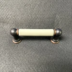 (5 Pack) 3 Inch Ceramic Insert Pull Almond With Bronze Copper Highlights. Fixed Price $30.27.
