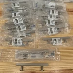 Lot 33-PC Brainerd Square Bar Pull Cabinet Stainless Steel P37256W-SS-CP 3-3/4. Fixed Price $36.99.