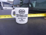 Freeman South Dakota Coop Oil Fertilizer Anchor Coffee Cup. Fixed Price $17.50.