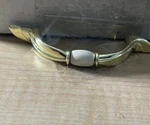 25- Avante Polished Brass White Ceramic Center 3" Ctr. Cabinet Pull Handle. Fixed Price $35.00.