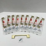 Richelieu Satin Brass Cabinet Drawer Pull Handles 128MM (5 1/32") Lot Of 10 New. Fixed Price $39.99.