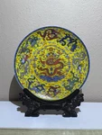 Vibrant Chinese Porcelain Plate Yellow Ground With Multi-colored Dragons. Fixed Price $34.99.