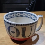 Anthropologie Ceramic Mug Red Blue White Pattern Glossy Finish Round Handle. Fixed Price $20.00.