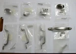 8 Liberty Hardware (4) Satin Nickel Oval Knobs And Spoon Foot Cabinet Pulls. Fixed Price $15.00.