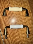 Lot Of 38 Vintage Solid Brass Porcelain Cabinet Pulls 3IN Center New. Fixed Price $80.00.