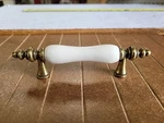 Hickory Hardware Tranquility 3" Ctr Brass Cabinet Pull Almond Center P733-LAD. Fixed Price $7.69.