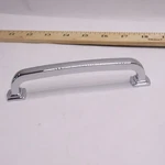 Amerock Cabinet Pull Polished Chrome 5-1/16 Center To BP5534626. Fixed Price $6.73.
