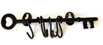 Anthropologie Vintage Cast Iron Skeleton Key Wall Rack 6 Sliding Hooks 1990S. Fixed Price $23.00.