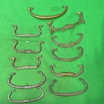 Eleven Ornate Solid Metal Antique Drawer Pulls Bails. Fixed Price $22.85.