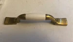 Amerock Cabinet Drawer Pull Made Of Burnished Brass, White Ceramic BP76240-WB. Fixed Price $7.99.