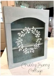 Shabby Romantic Cottage Core Light Blue Glass Front Cabinet With Wreath. Fixed Price $48.00.