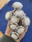 8 Pack 1-1/4 Inch Avante Knob White Insert With Chrome. Fixed Price $15.00.