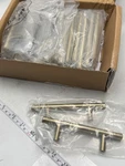 Amazonbasics Euro Bar Cabinet Handle 3IN Hole Center 25-PACK Gold Champagne. Fixed Price $37.99.